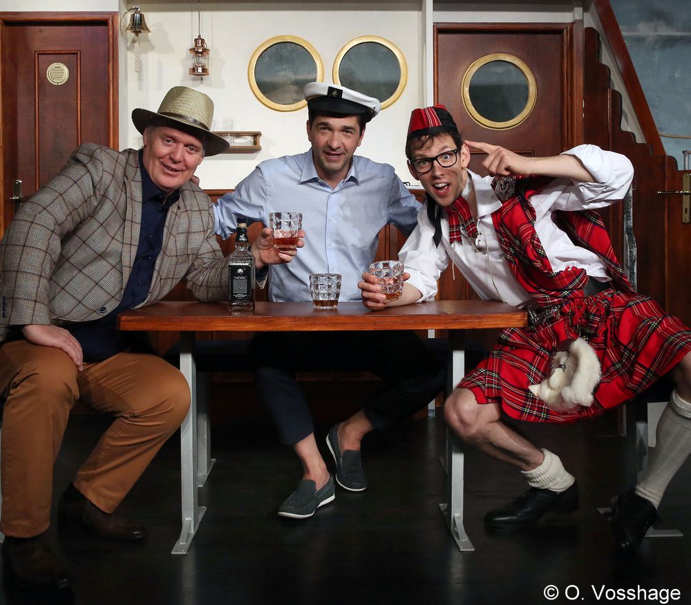 Drei Mann in einem Boot